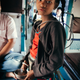 A young acrobat boarded the train at Jagiroad, Assam, performing an astonishing floor routine of tumbles and cartwheels down the aisle, hoping for donations.